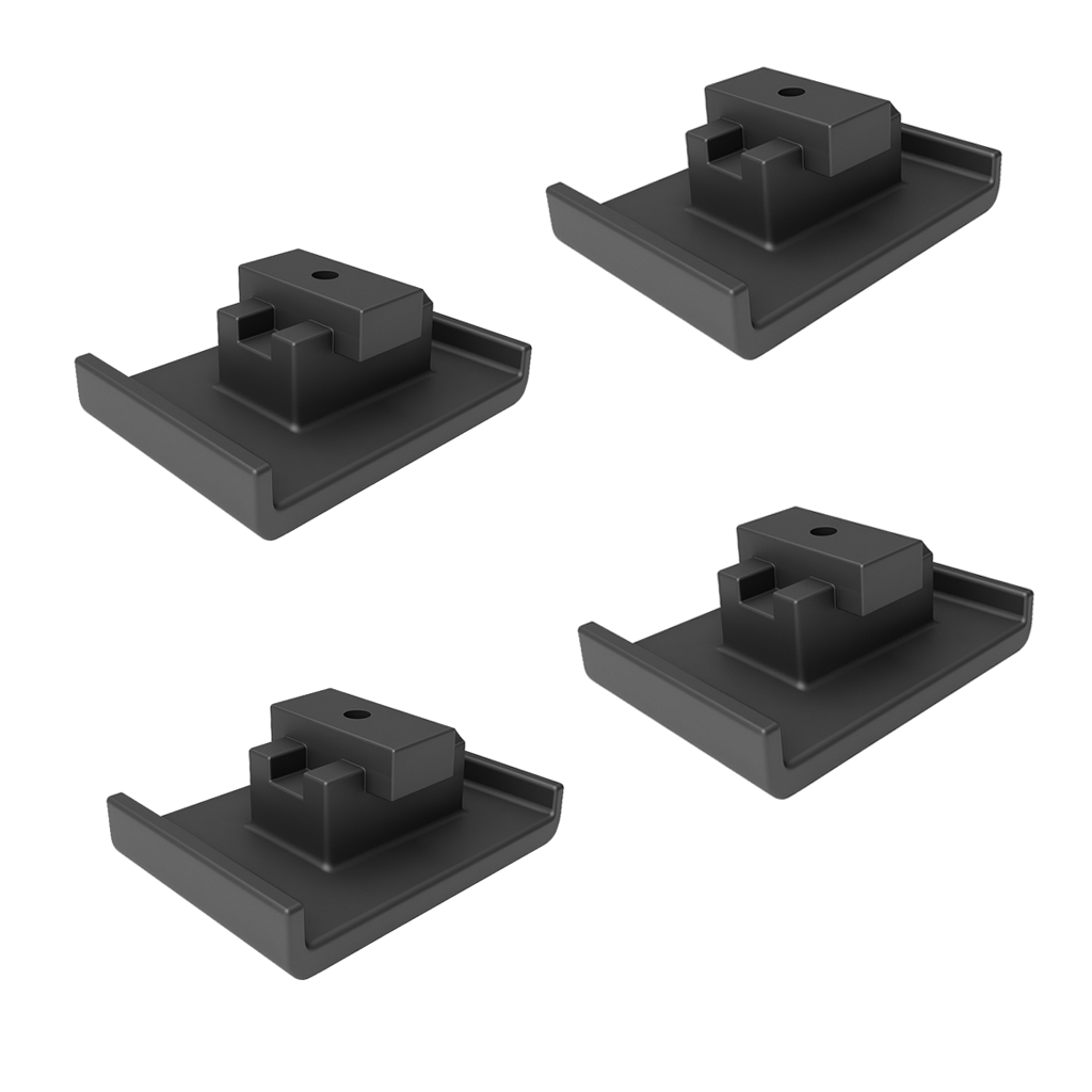 Black high-density polyethylene container shoes designed to protect driveways and job sites when placing or moving standard ISO shipping containers