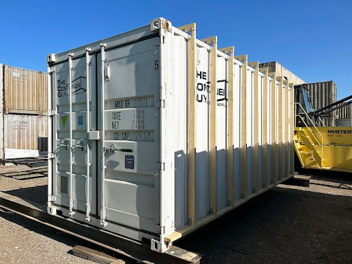 Shipping container with exterior wood framing brackets installed – 10 GA galvanized steel bracket kit for 20ft or 40ft containers, ideal for siding or roof-building applications