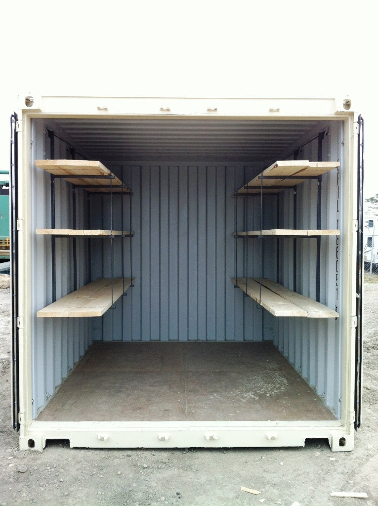 instant shipping container shelving brackets installed on inside of a short cube shipping container